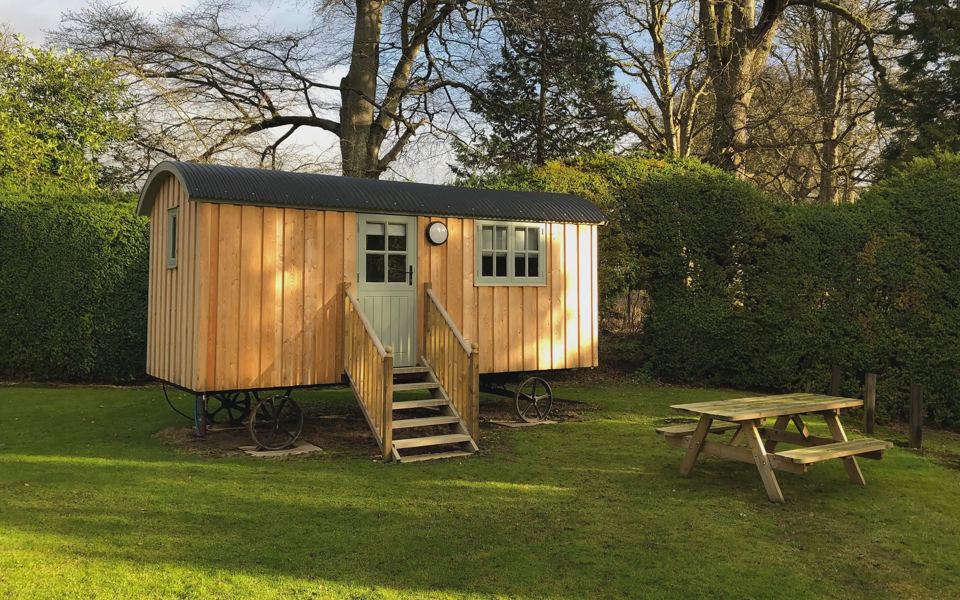 Shepherd hut with picnic bench