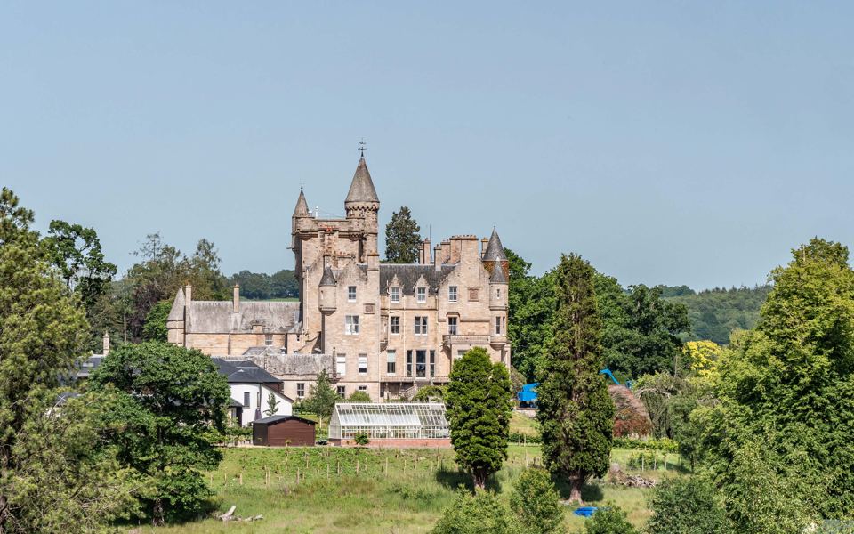 Camphill House through the trees