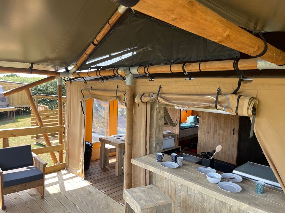 Deck and kitchen inside the tent