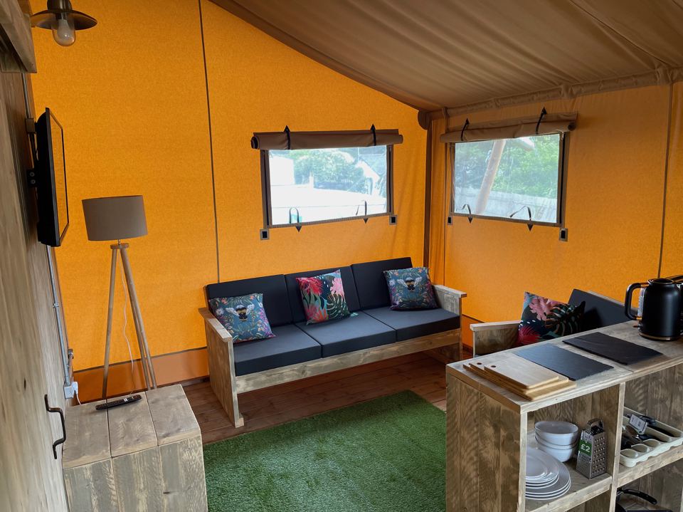 Sofa inside the safari tent
