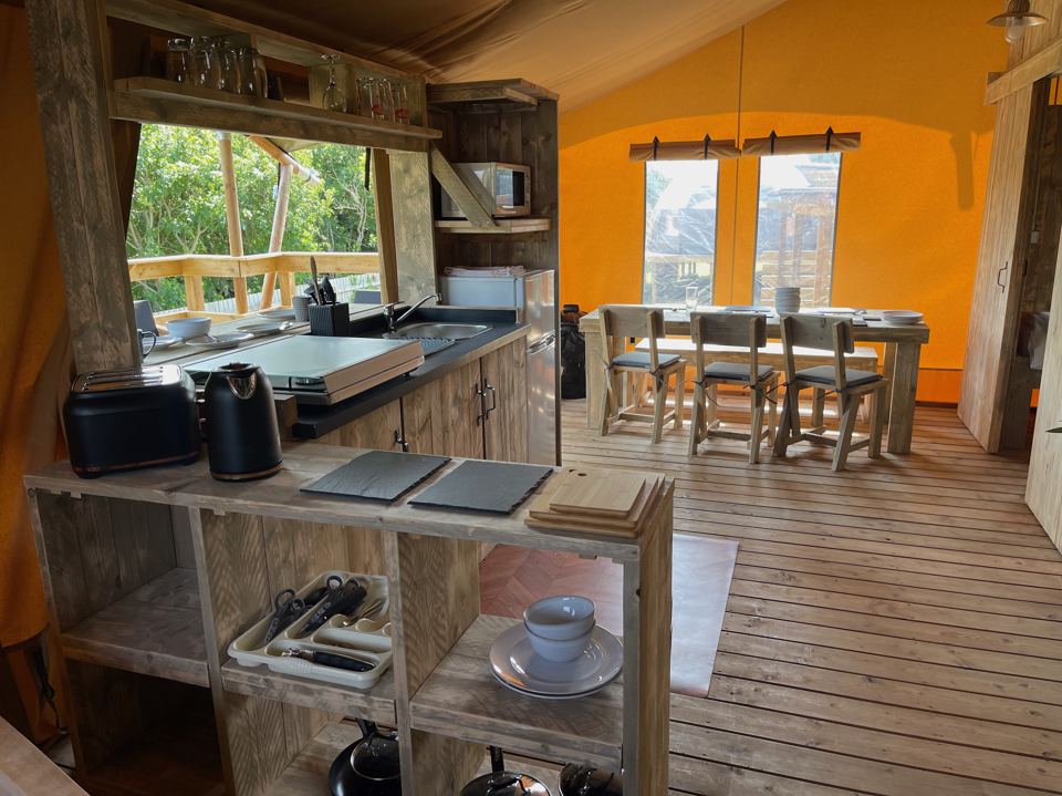 Kitchen and dining area in the tent