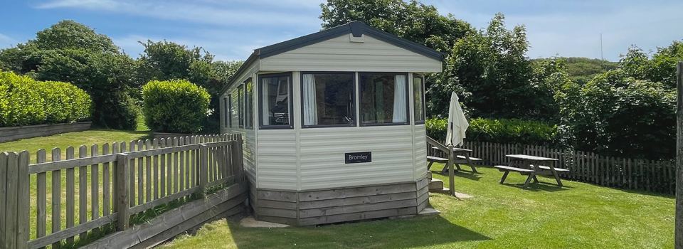 Static caravan with picnic table