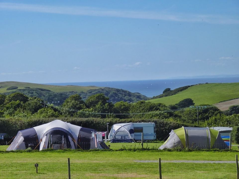 Tents with a distant sea view