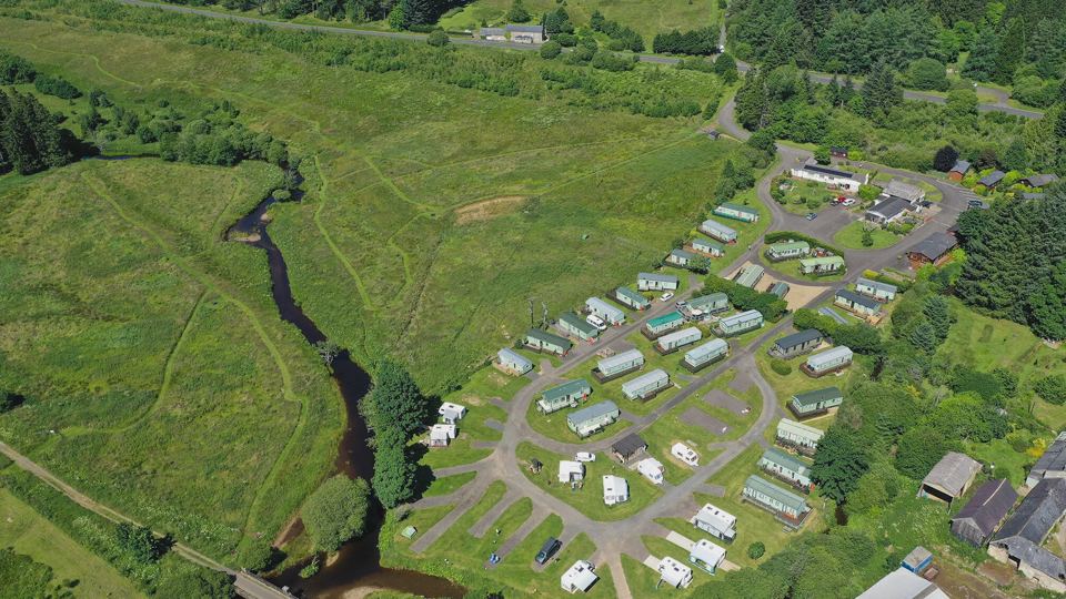 Caravan park by the burn