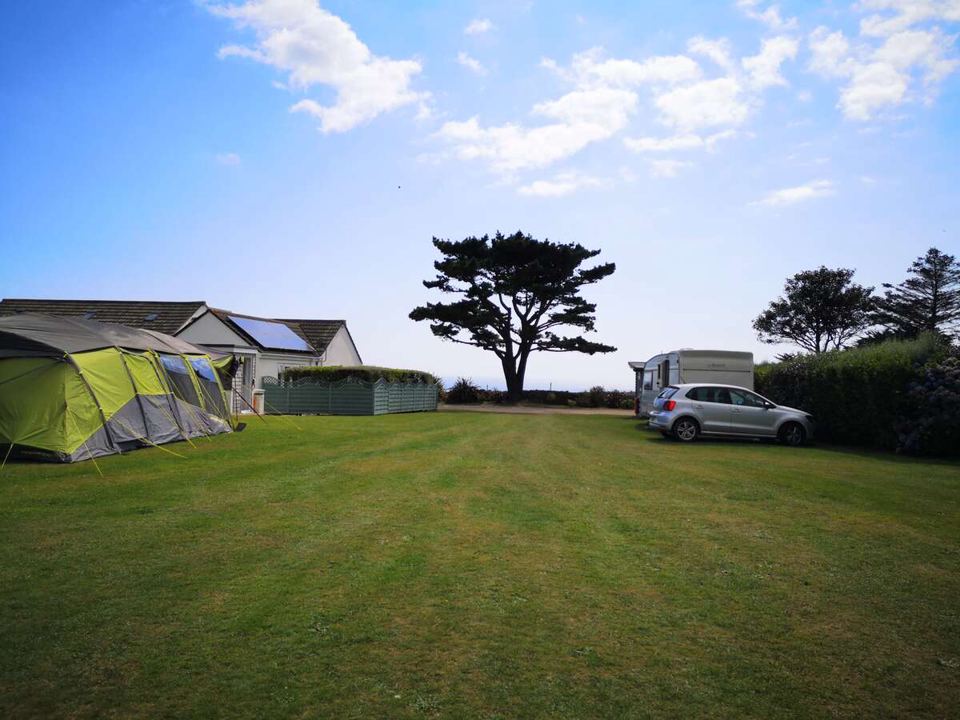 Large tent on a pitch near the sea