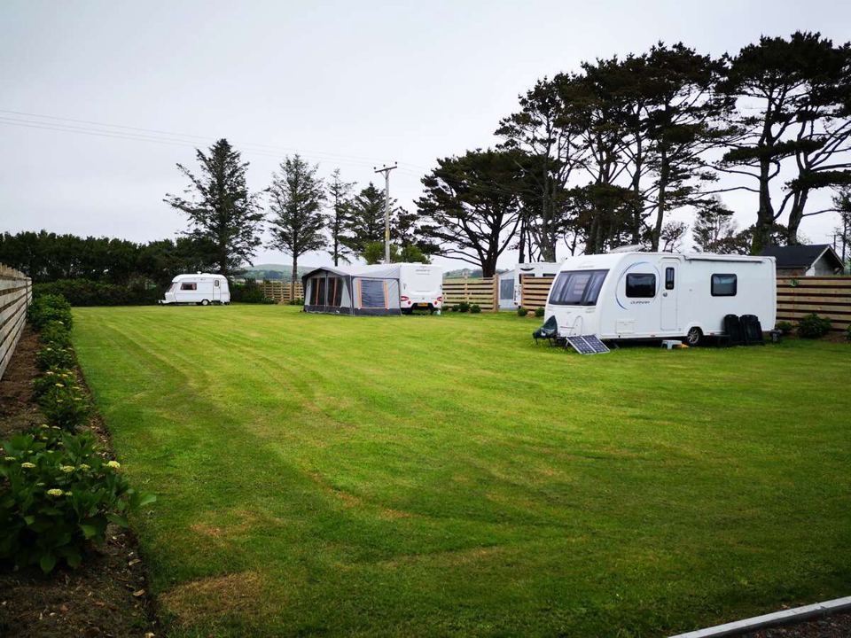 Caravans along the far hedge