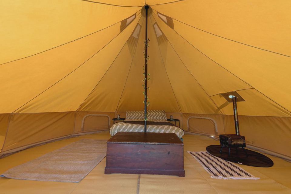 Inside a yellow bell tent
