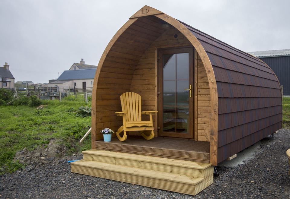 Camping pod with rocking chair