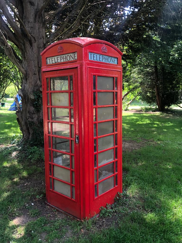 Red phone box on site