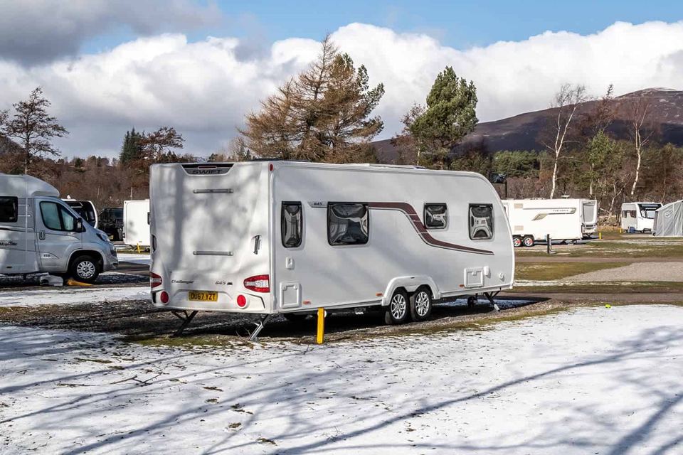 Caravan pitch with snow