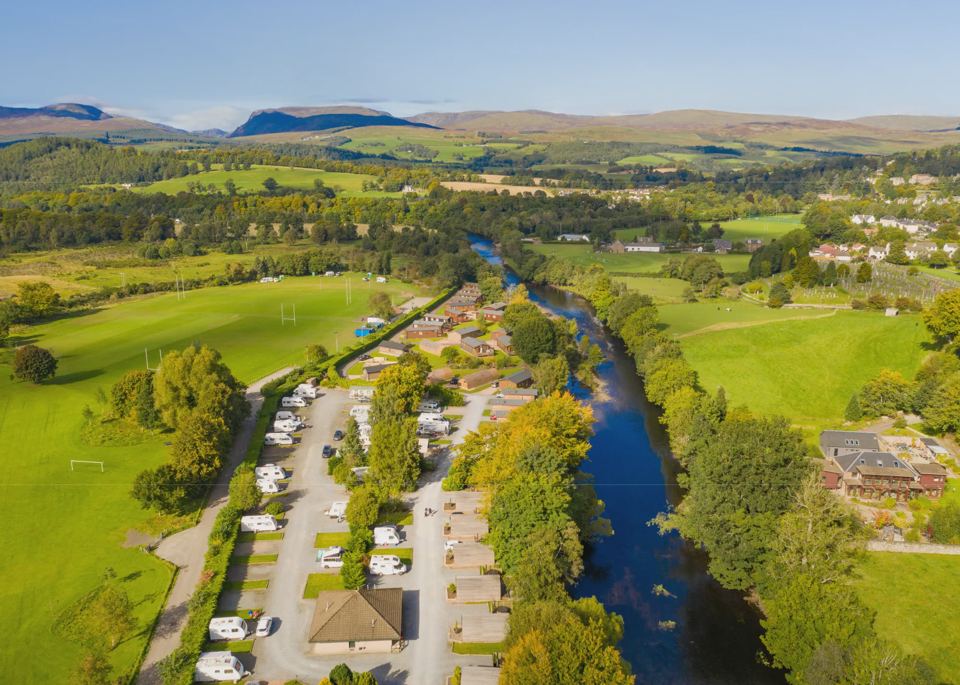 Touring pitches beside the river