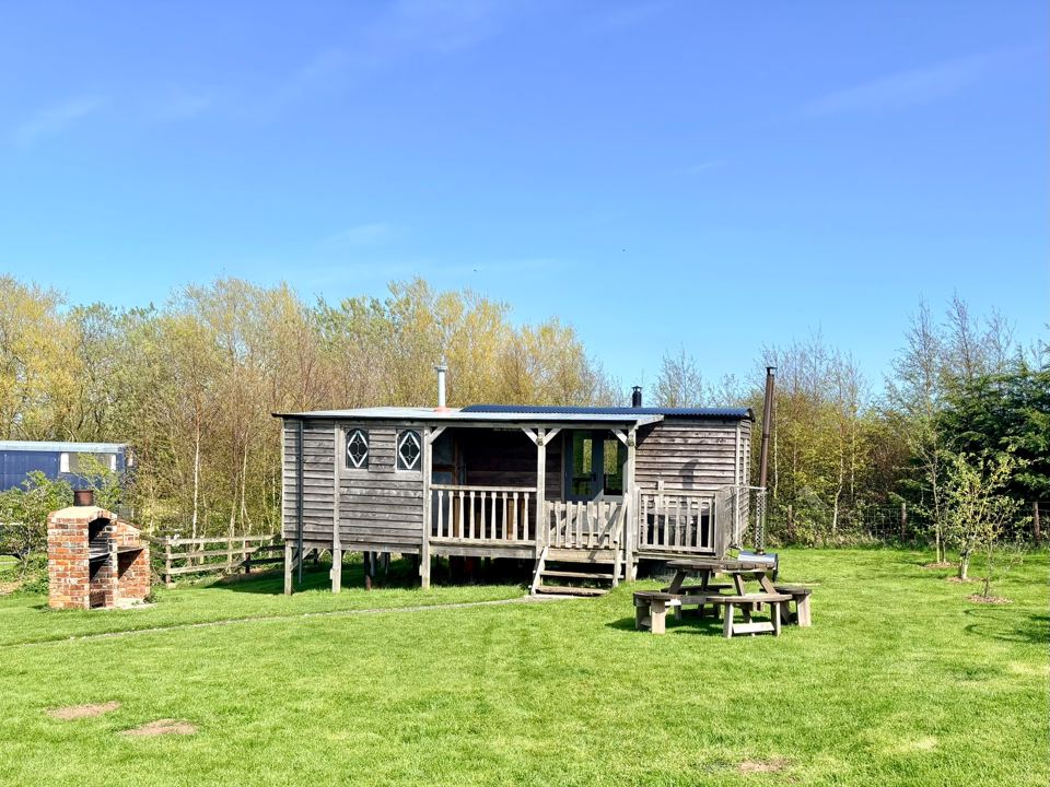Hut with veranda and picnic bench