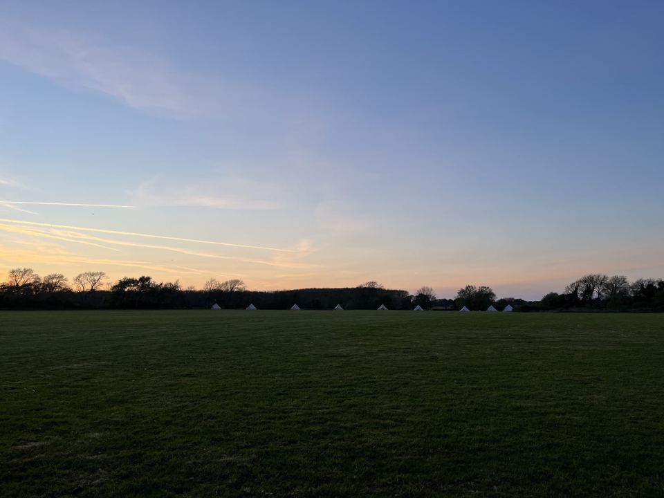 Bell tents at dusk