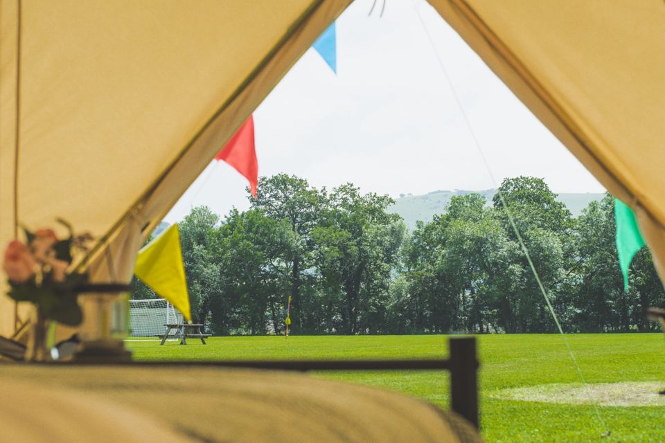 View over the field from a bell tent