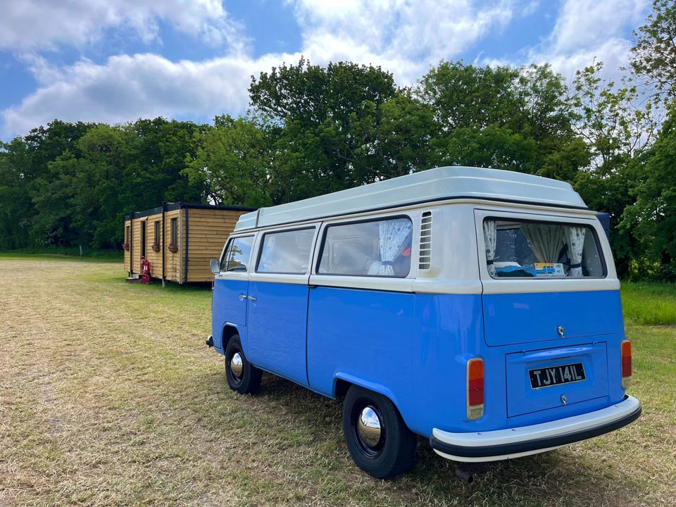 Campervan beside the field