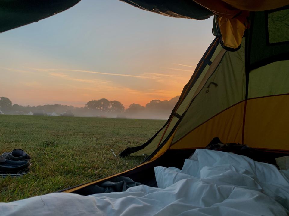 Sunrise view from a tent door
