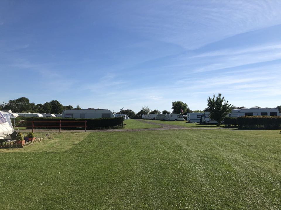 Caravans on mown grass