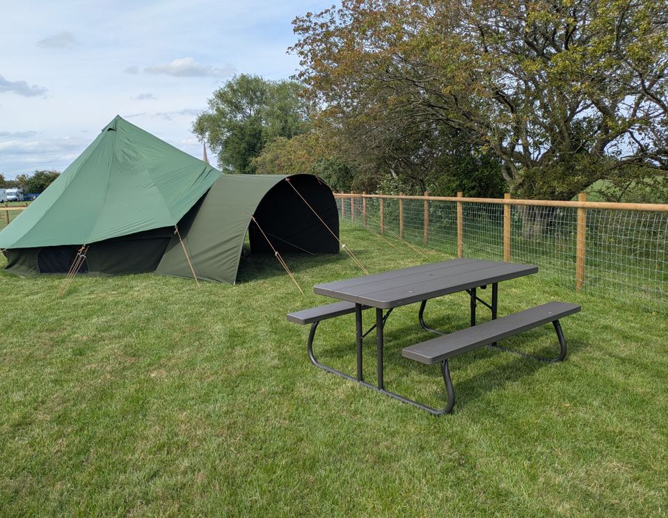 Bell tent with picnic bench