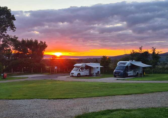 Motorhomes at sunset