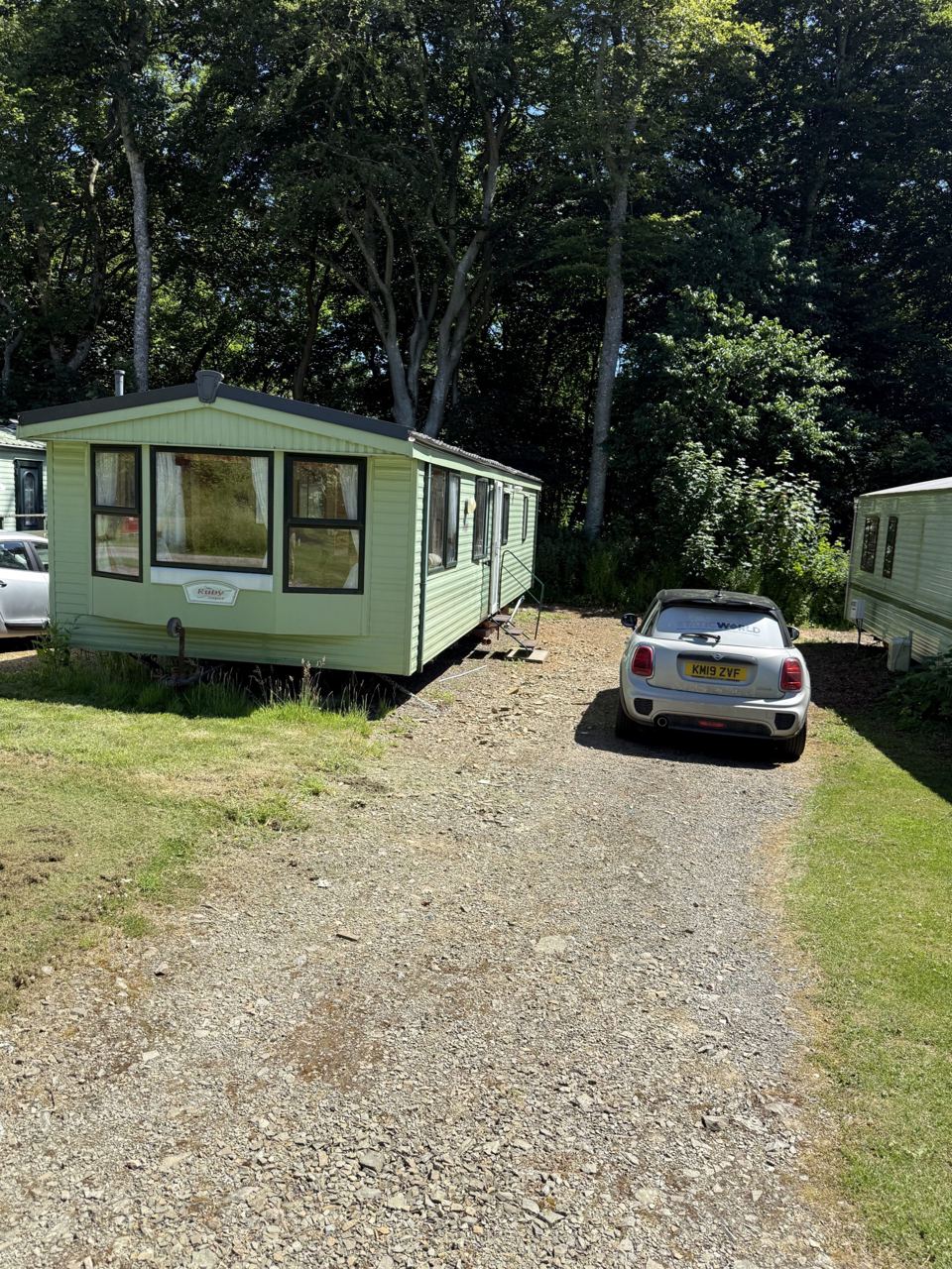 Caravan among trees