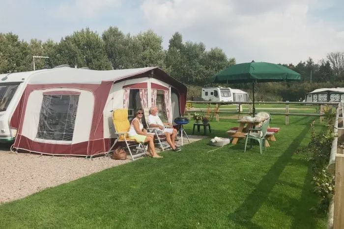Touring caravan with awning