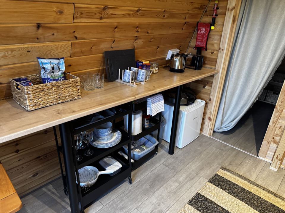 Pod kitchen worktop and fridge