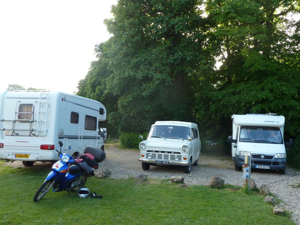 Motorhomes on gravel and grass
