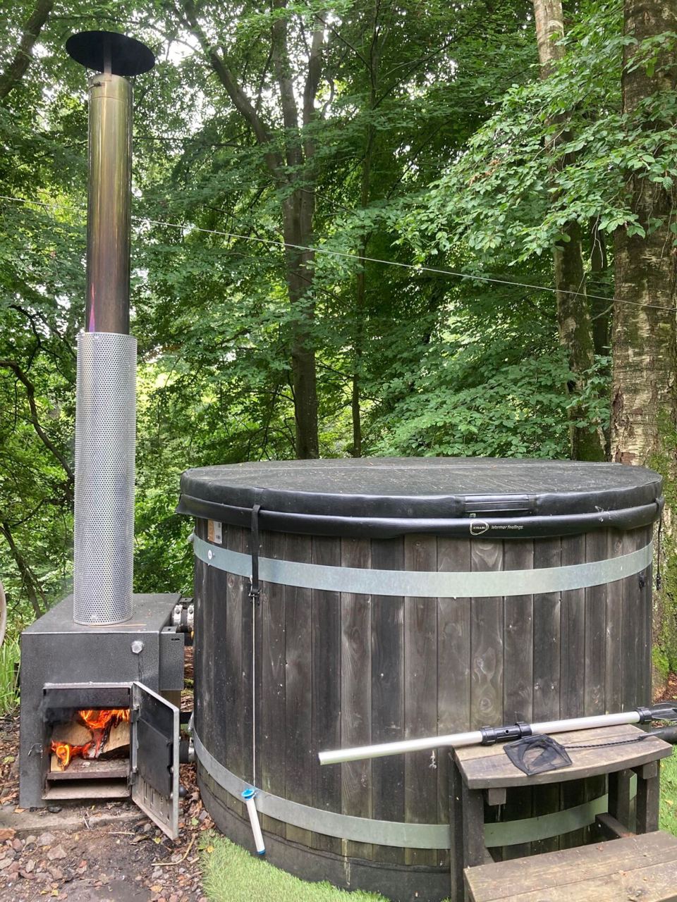 Hot tub with wood-burning stove