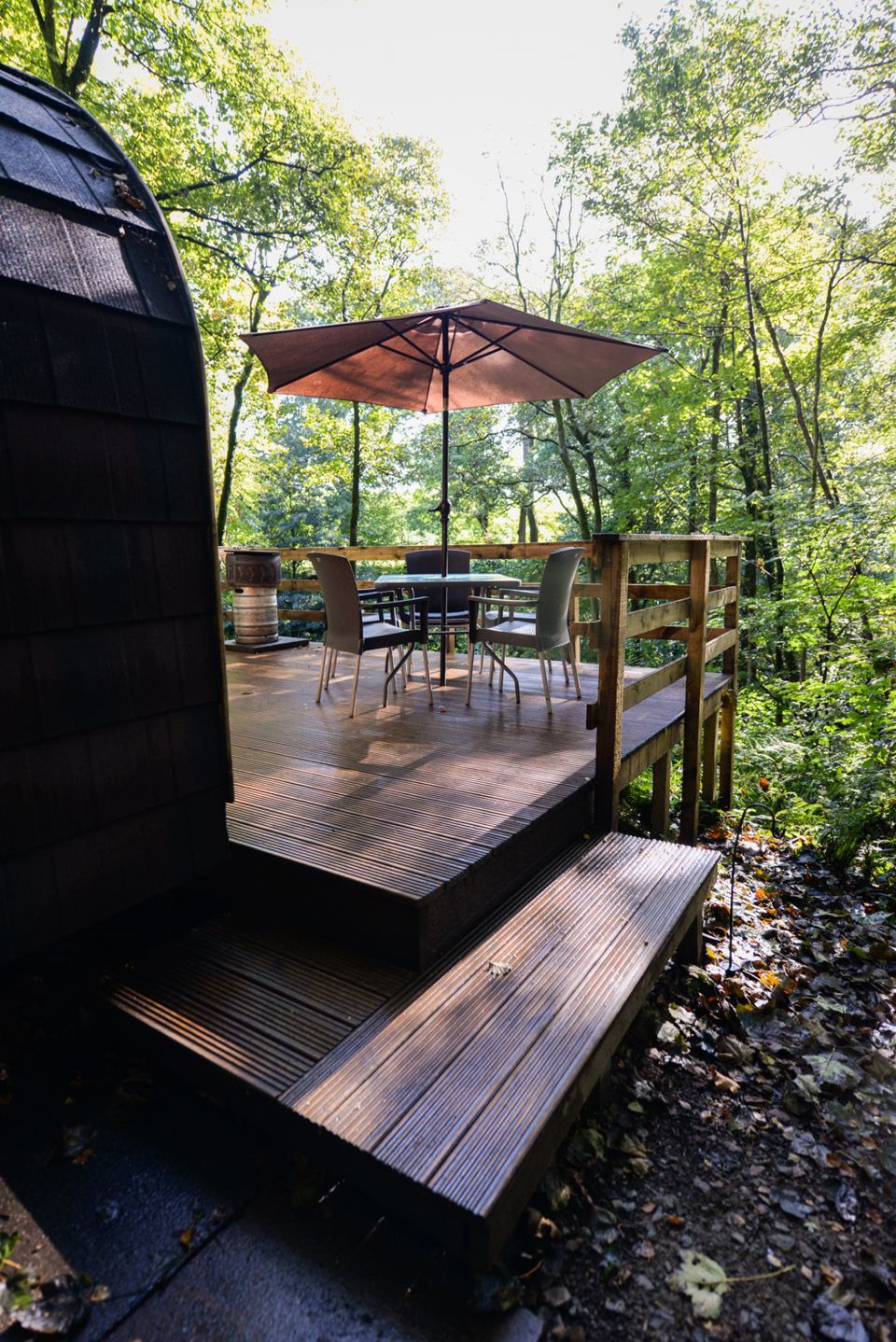 Deck with table and umbrella