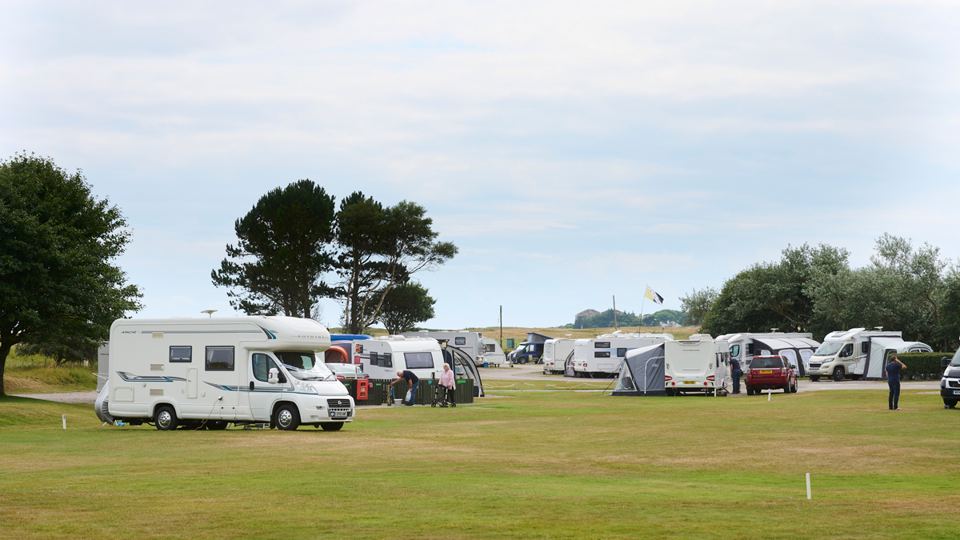 Motorhomes on the open grass
