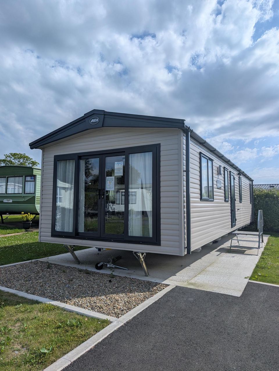 Static caravan and tarmac drive