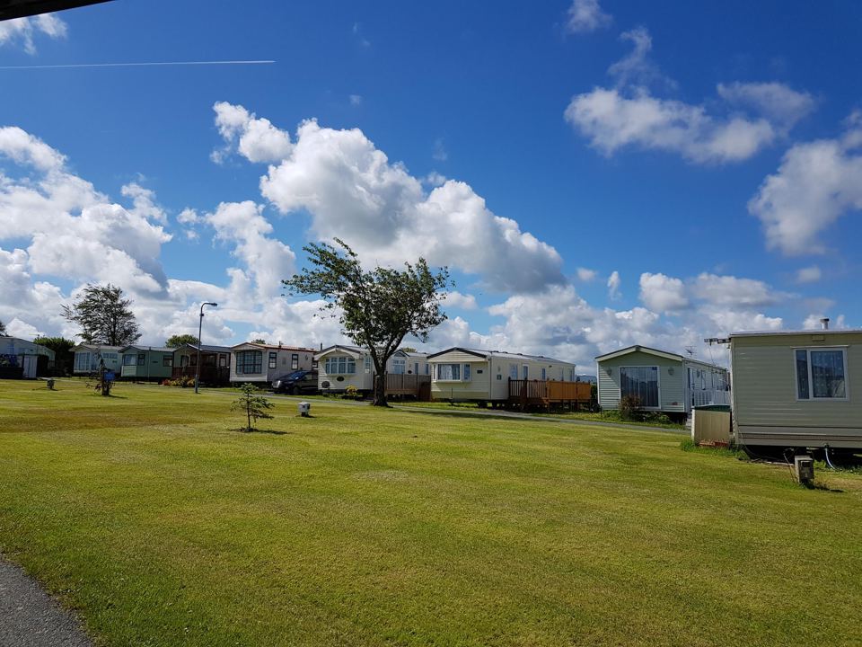Grass and caravans across the park