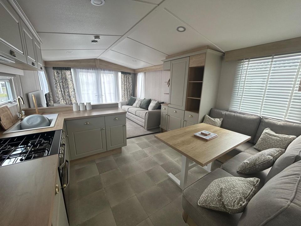 Inside a static caravan lounge and kitchen