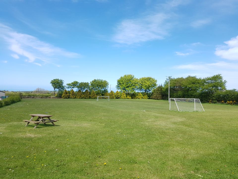 Football field with picnic bench