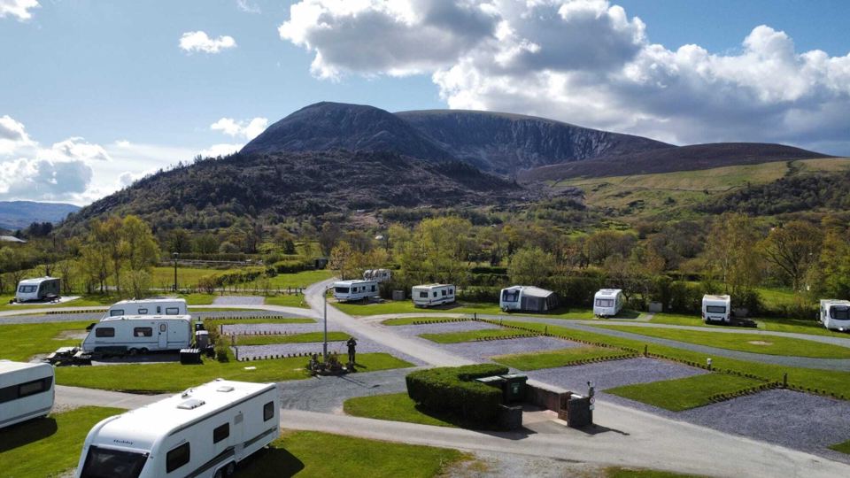 Hardstanding pitches below the mountain