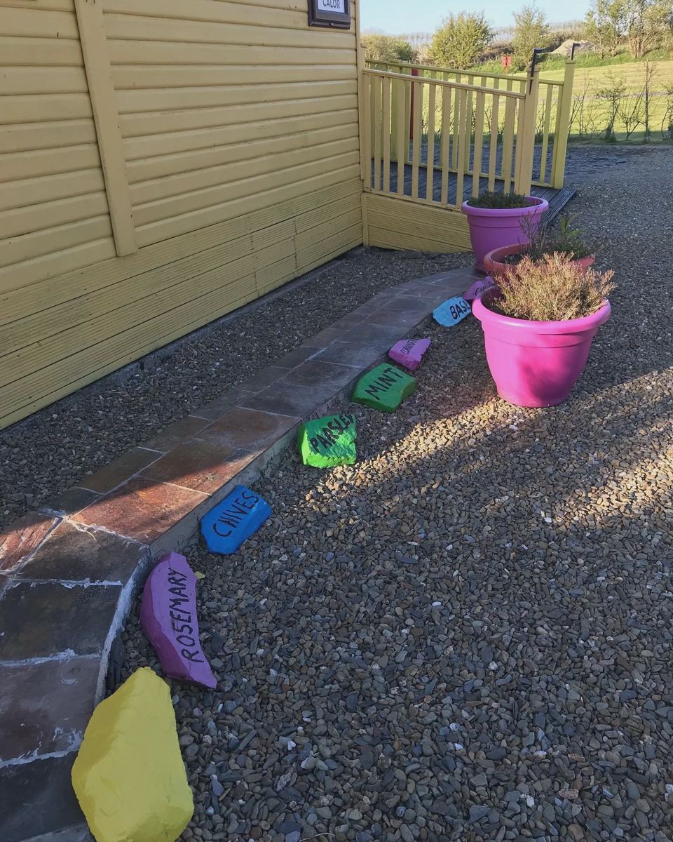 Painted cabin and planters