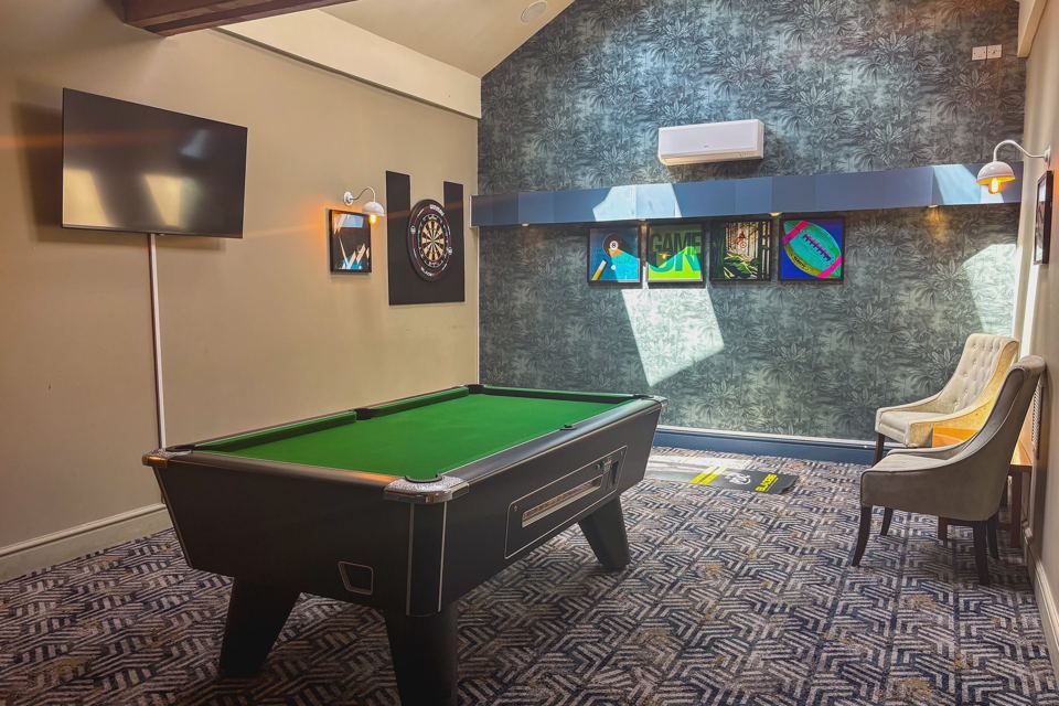 Games room with pool table