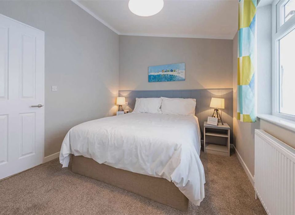 Bedroom with seaside picture