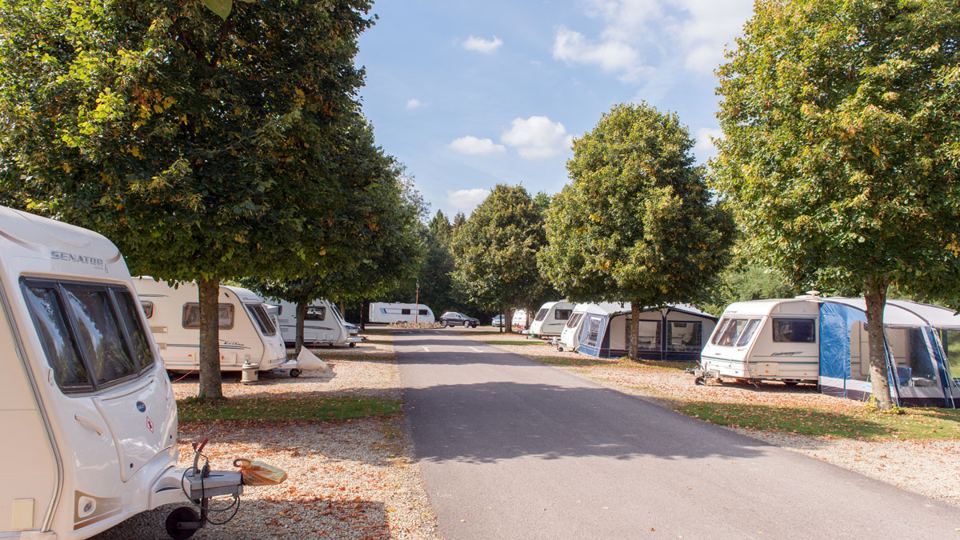 Caravans lined along the site road