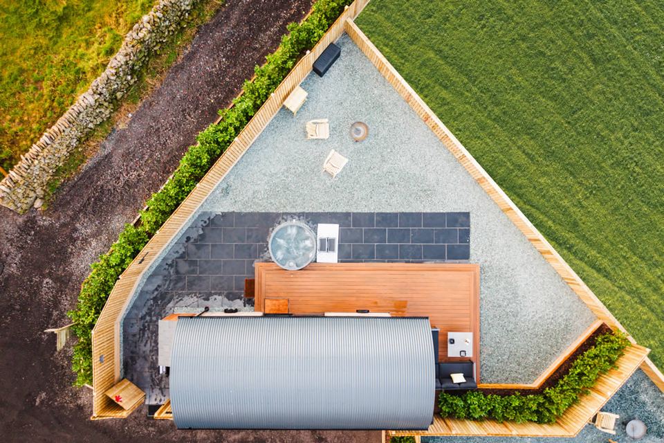 Aerial view of a pod and hot tub