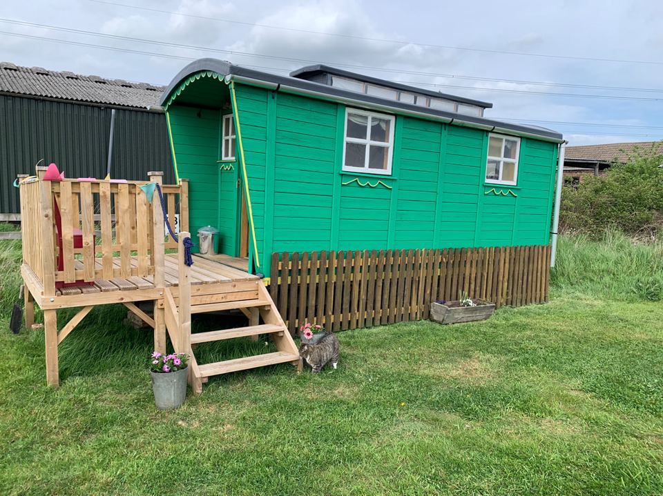 Green glamping wagon