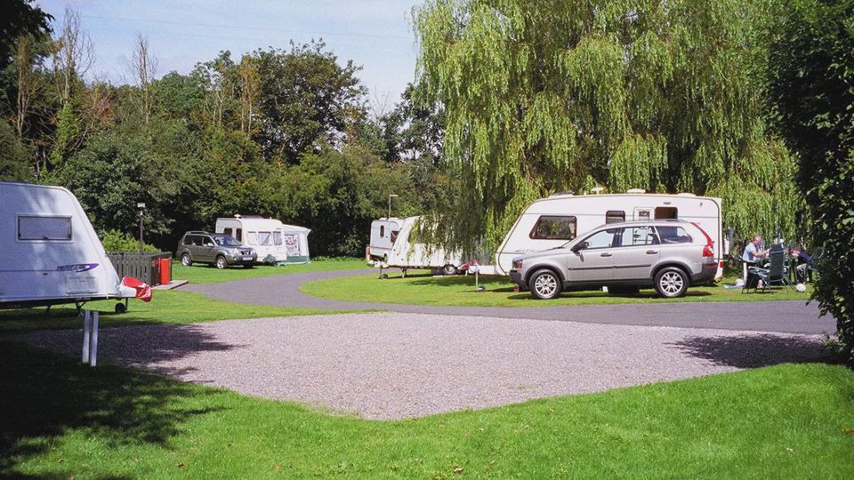 Gravel pitch beside the grass
