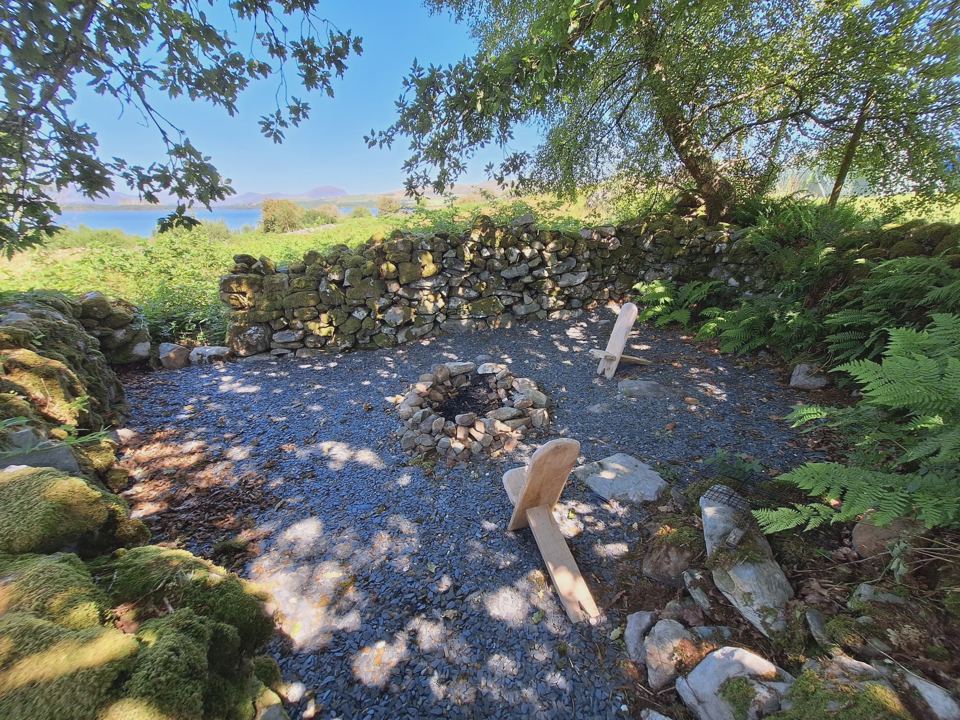 Stone-walled communal fire pit