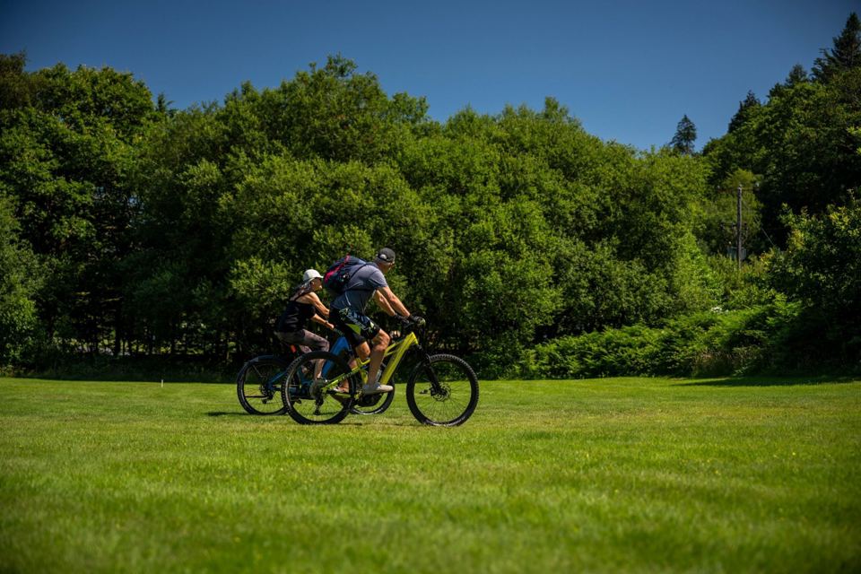 Cyclists on the grass