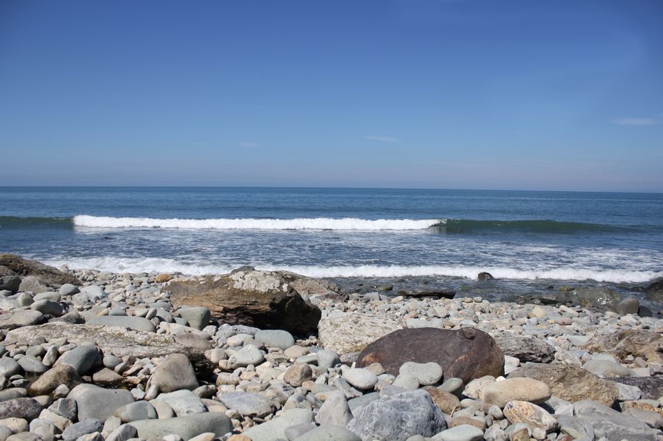 Shingle beach and waves