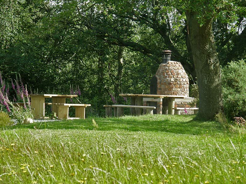 Pizza oven and picnic tables