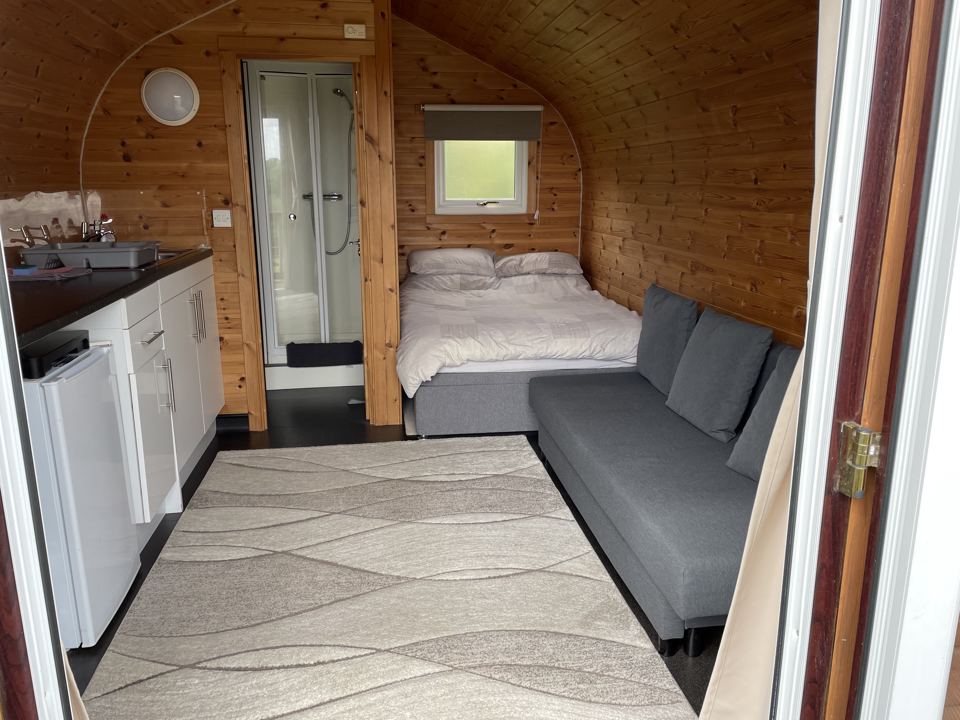 Cabin interior with sofa bed