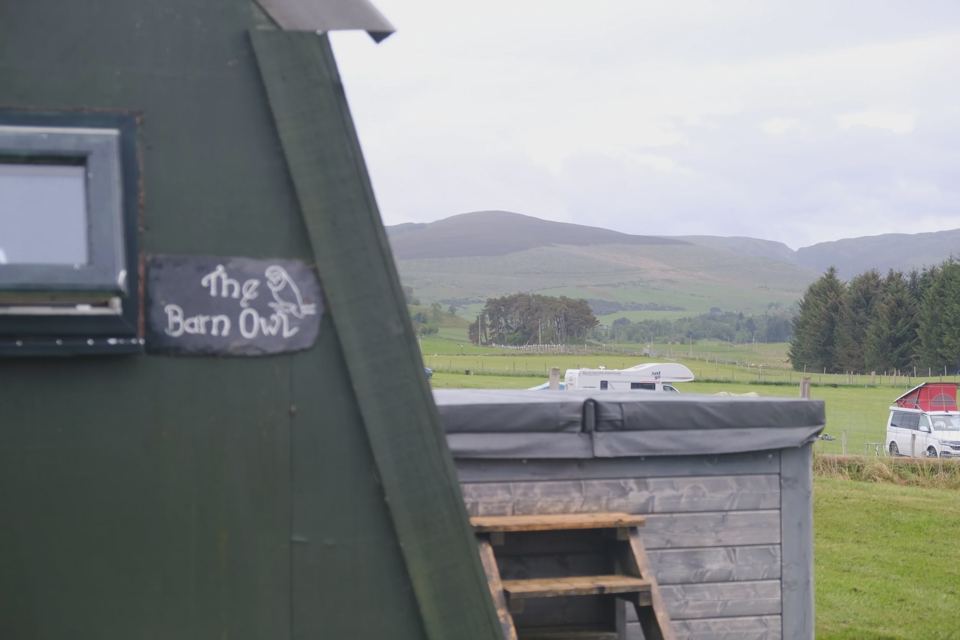 Pod and hot tub with hill views