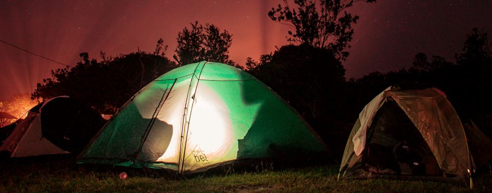 Tents lit up at night