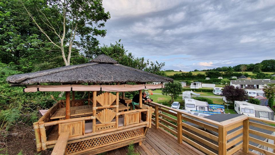 Thatched gazebo above the pitches